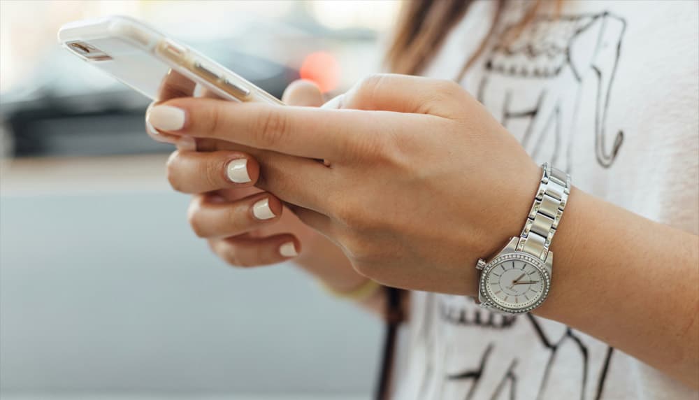 Customer checking an order status update on a smartphone
